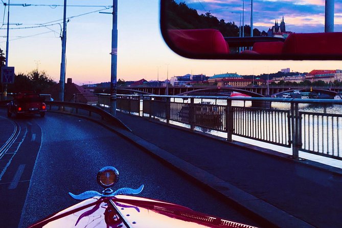 1,5 hour oldtimer convertible Prague sightseeing tour - Dancing House, Wenceslas Square, and Charles Square