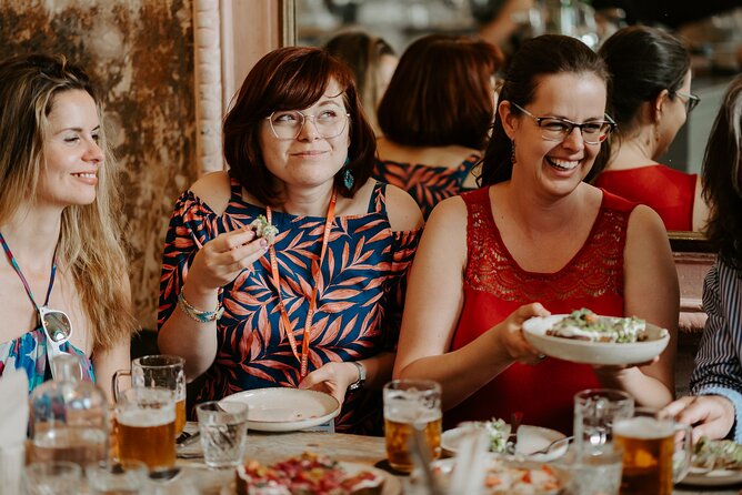 Award-Winning Prague Evening Old Town Food and Drink Tour - Crossing toward Mala Strana