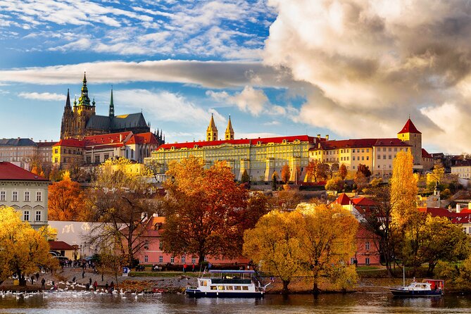 Best of Prague: Private City Walking Tour, Boat Cruise, and Typical Czech Lunch - The Vltava cruise on a wooden boat