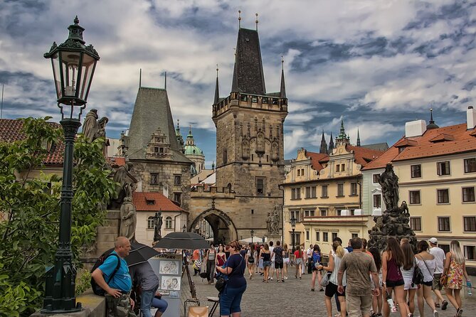Best of Prague Private Walking Tour (Left and Right Riverbank) - Crossing Charles Bridge with the city below