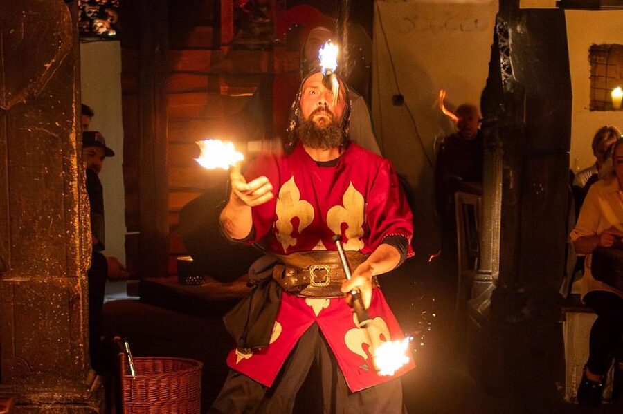 From Prague: Medieval Dinner, Show, Castle and Brewery - Music, dancers, and a fire show