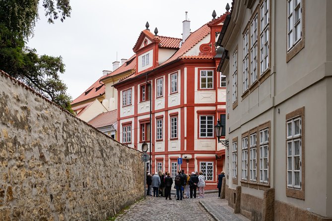 Full-Day Prague Tour with Prague Castle, Lunch and Vltava Cruise - Walking downhill through Lesser Town