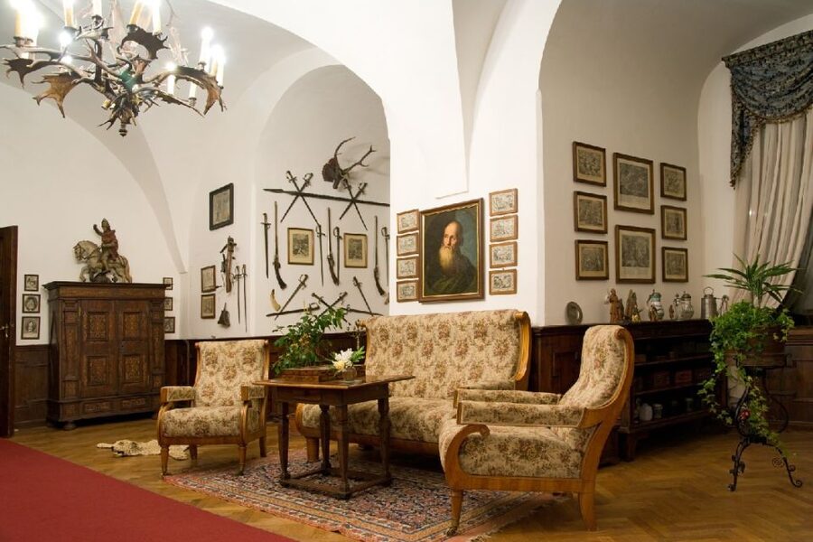 Konopiště: Chateau Tour from Prague - Inside Konopiště: rooms, weapons, and hunting trophies