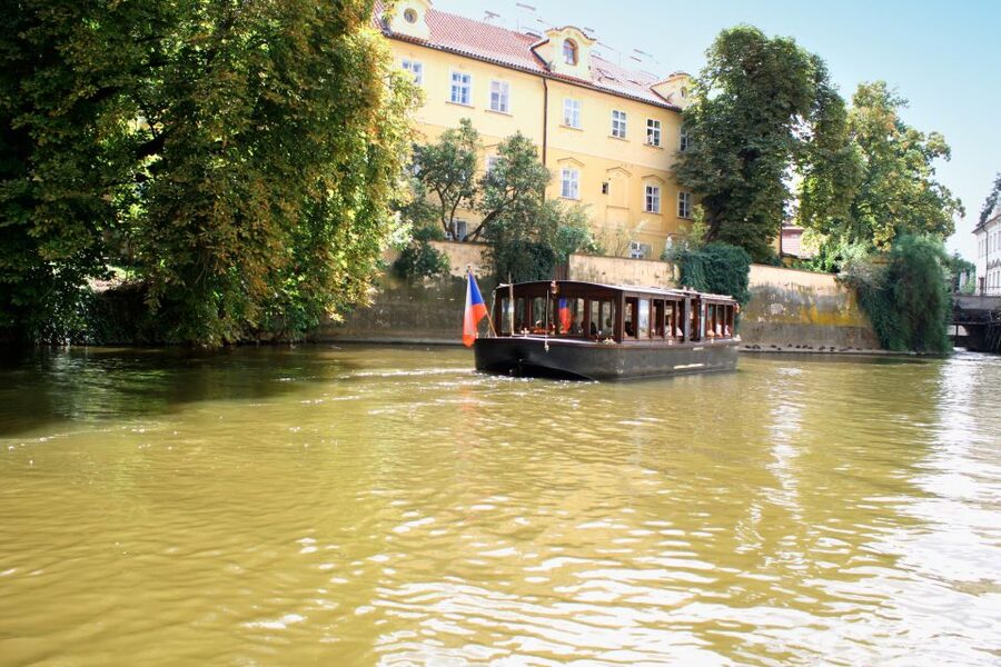 Prague: 1.5-Hour River Boat Cruise and Guided Tour - Boarding below Charles Bridge