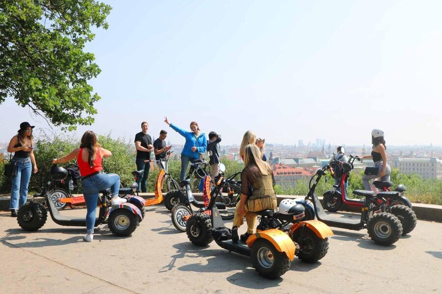 Prague: 2-Hour Trike Live Guided Tour of Old Town - Crossing into Lesser Town and climbing toward the castle