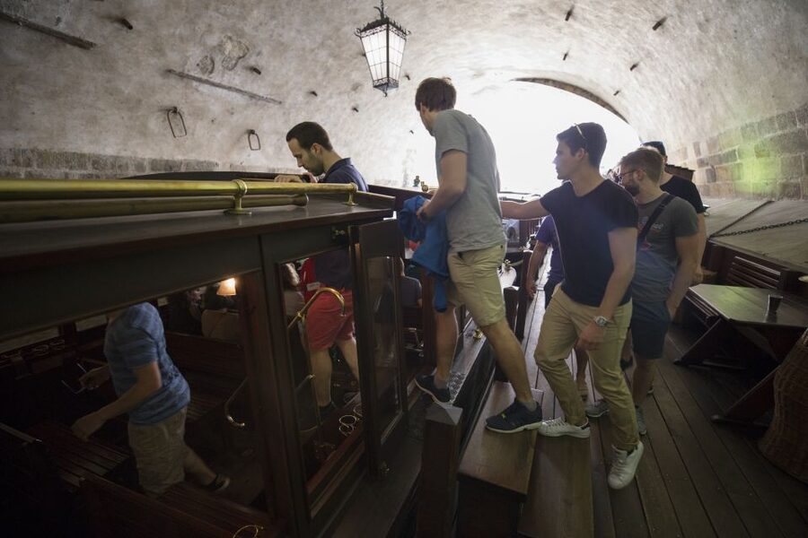 Prague: 3–Hour Castle Grounds Walking Tour and River Cruise - Taking the tram to Prague Castle