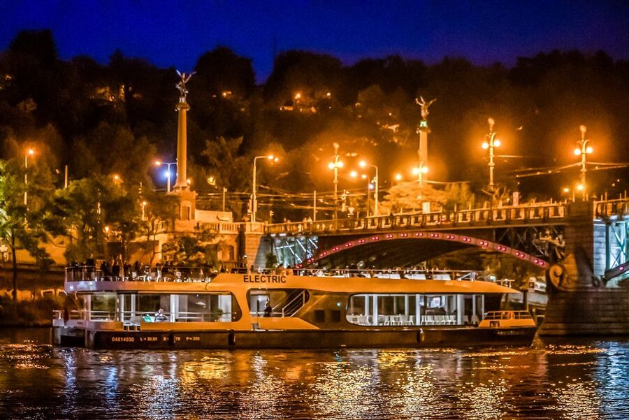 Prague: 50-Minute Sightseeing Evening Cruise - Audio guides, music, and onboard service