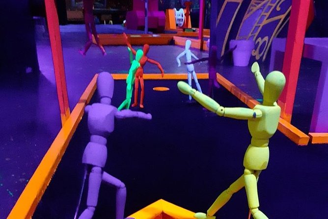 Prague Black Light Mini Golf and Games with free Drinks - Prague art, glow paint, and unusual photo chances