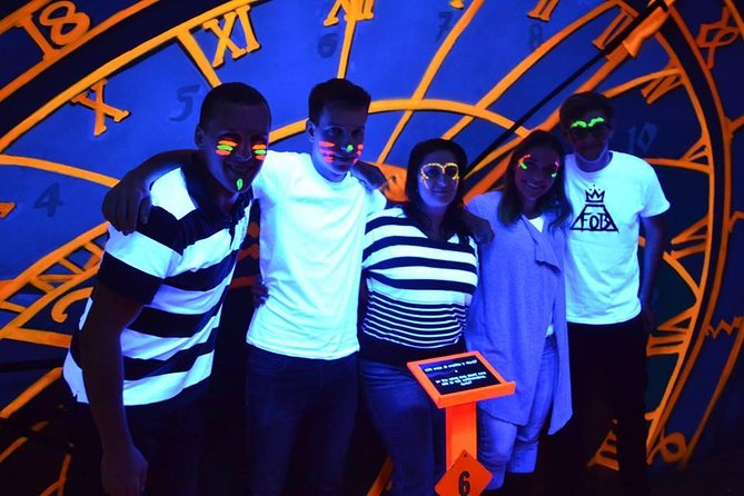 Prague Black Light Mini Golf and Games with free Drinks - Playing the 18 glowing holes