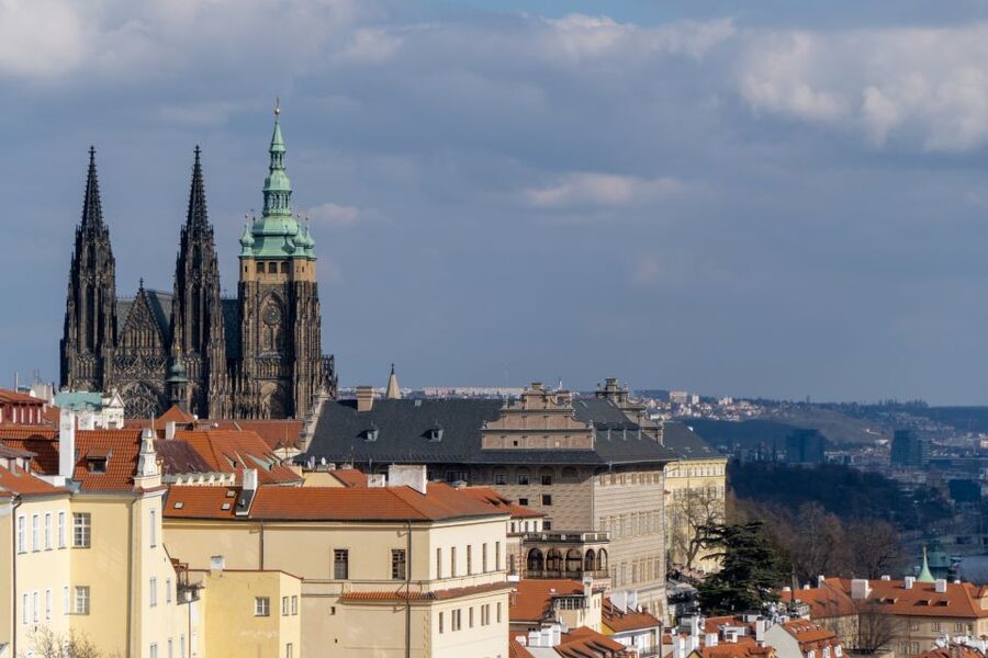 Prague: Castle Grounds & Highlights Walking Tour small-group - The Old Royal Palace and its warm stone colors