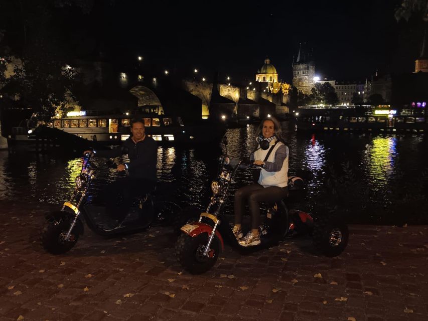 Prague City sightseeing in Night Trike Tour - John Lennon Wall and the riverfront sights