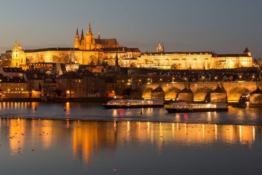 Prague: City Tour and Dinner Cruise with Hotel Pickup - Boarding the boat on the Vltava