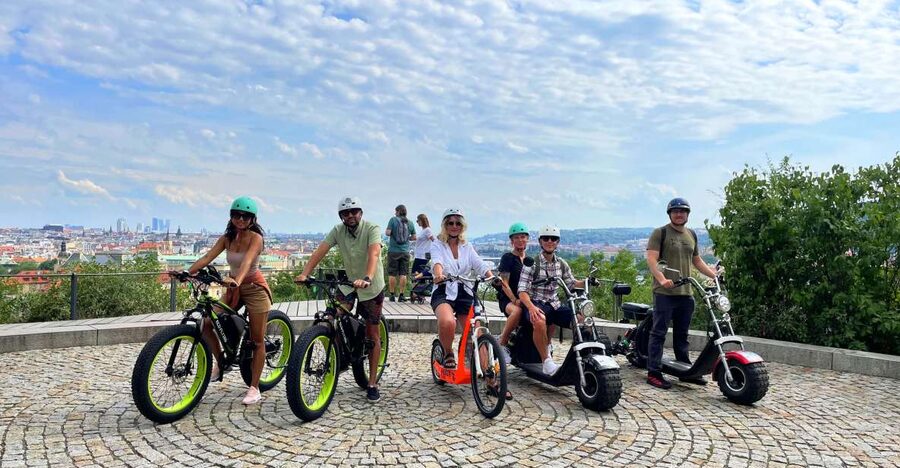 Prague: City Viewpoints Tour by Electric Fat Bike - Crossing Mánes Bridge toward the best panorama