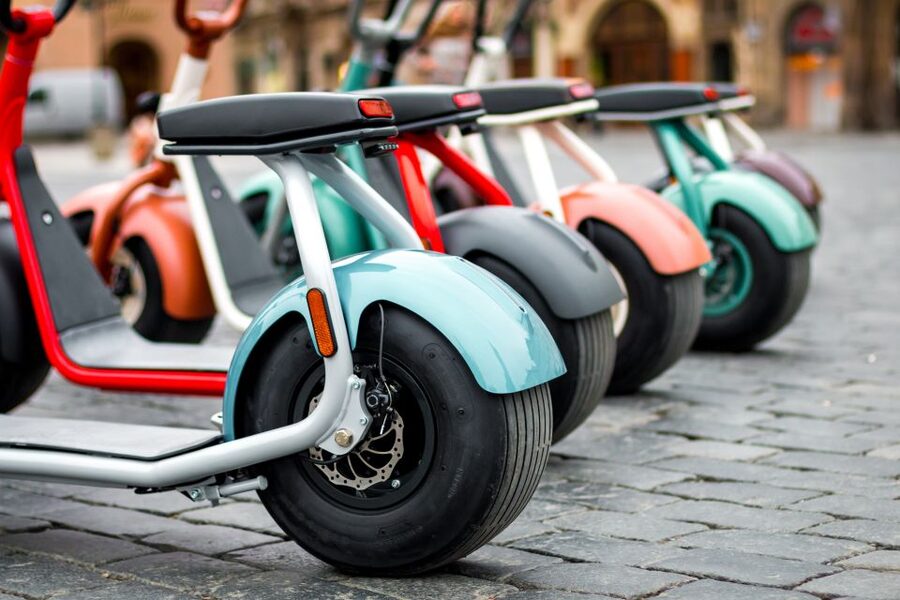 Prague: Fat Tire E-Scooter Guided Tour - The Lennon Wall and return through Lesser Town