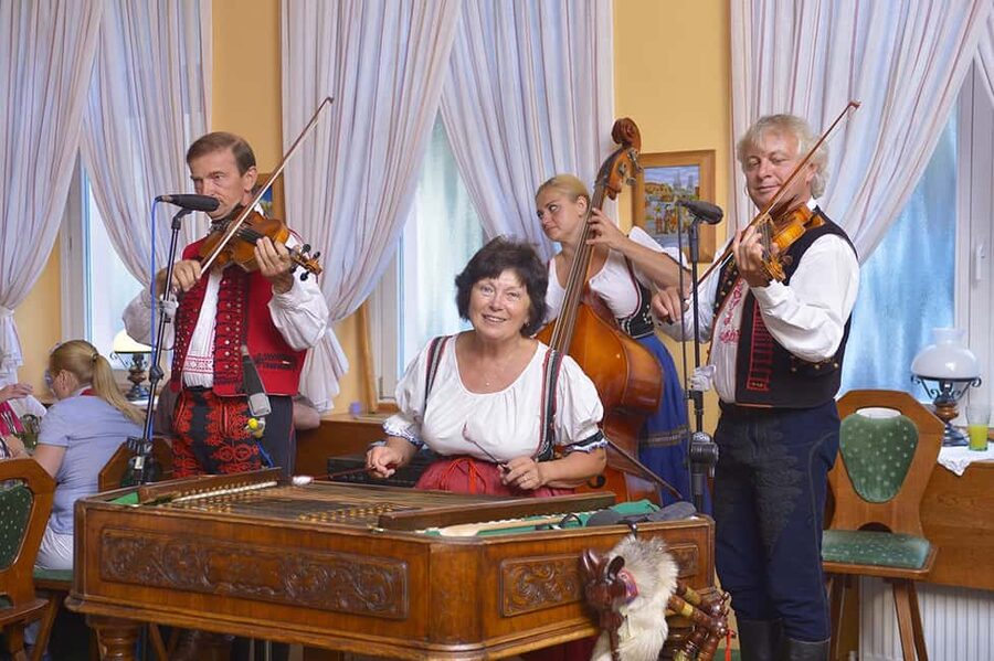 Prague: Folk Dancing Dinner Experience - Entering the decorated restaurant