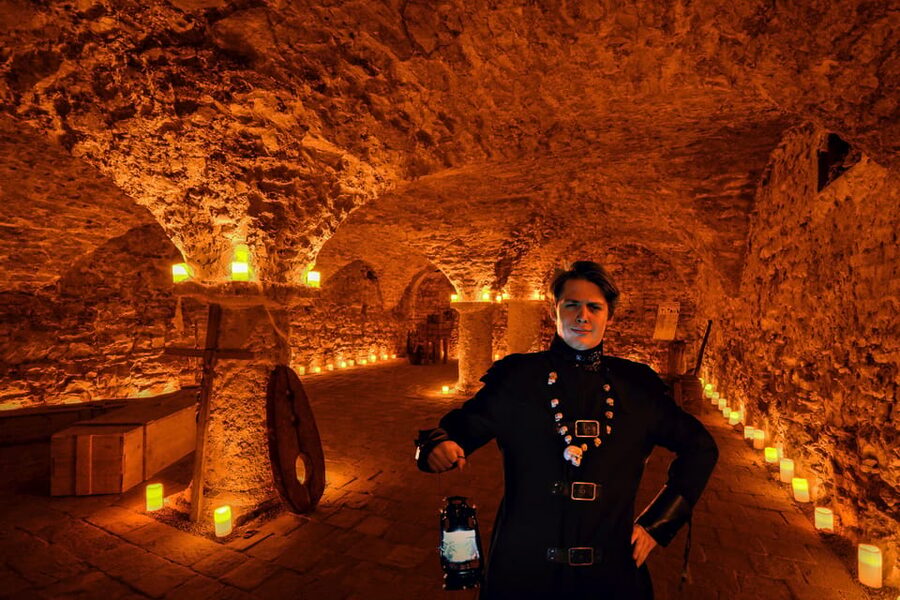 Prague: Ghosts, Legends, Medieval Underground & Dungeon Tour - Prague after dark, with a lantern in hand