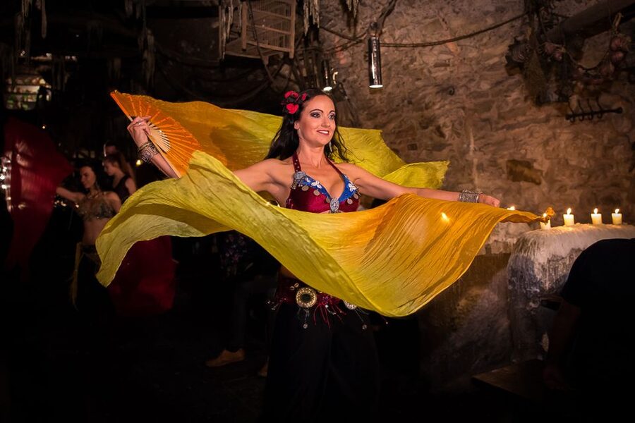 Prague: Medieval Dinner with Transfers - A medieval cellar, with a modern dinner show