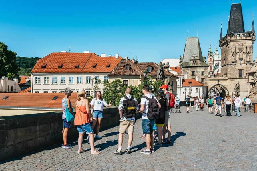 Prague: Old Town, Astronomical Clock and Underground Tour - Crossing Charles Bridge from Lesser Town