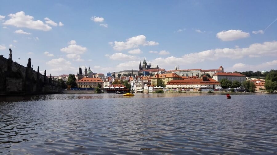 Prague: Old Town Guided Walking Tour and City Boat Ride - A one-hour cruise under Charles Bridge