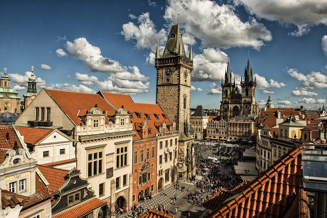 Prague Old Town Highlights Walking Tour - Crossing Charles Bridge toward Prague Castle