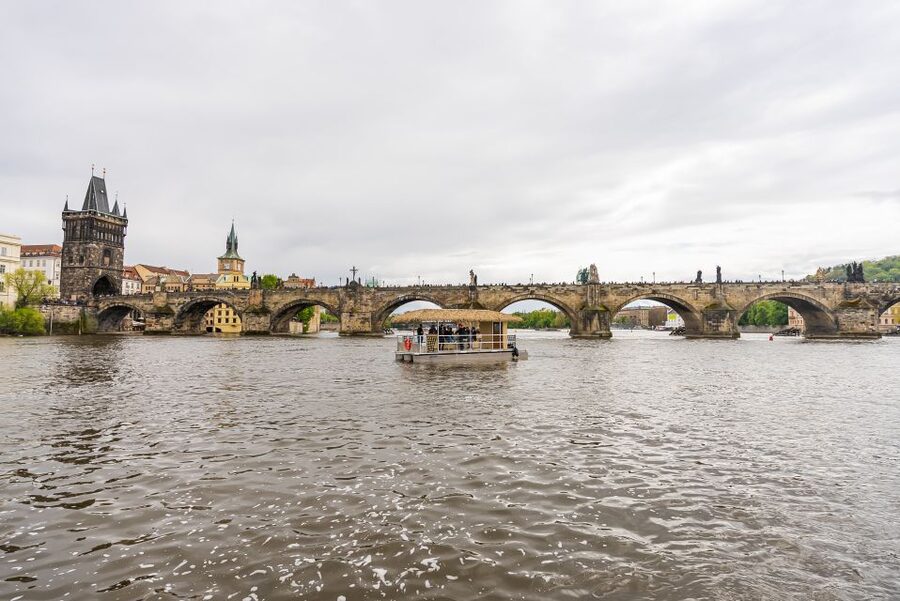 Prague: Party Tiki Boat Sightseeing Cruise with Drinks - Boarding beside the houseboats