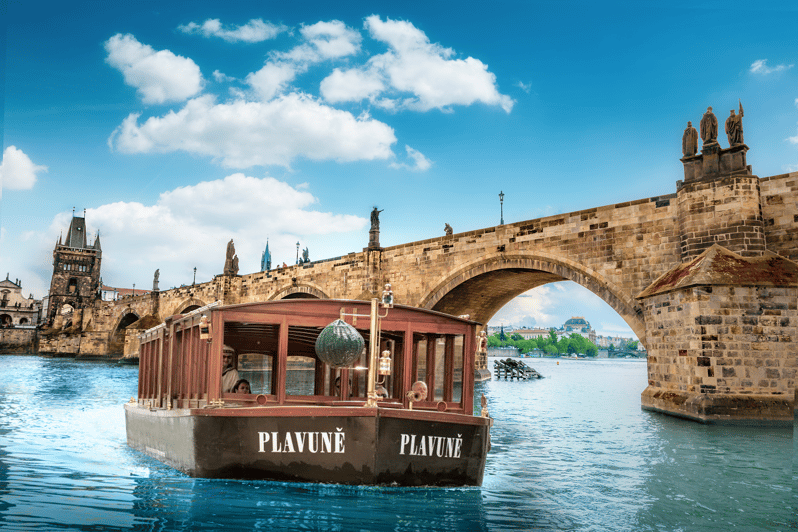 Prague: River Cruise, Charles Bridge Museum, & Walking Tour - Boarding a historic boat for Certovka