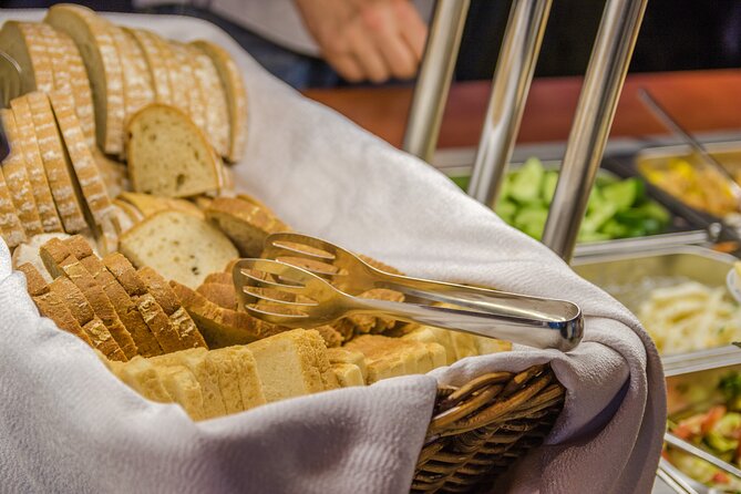 Prague: Sightseeing Boat Cruise with Buffet Dinner - The Dancing House and modern Prague