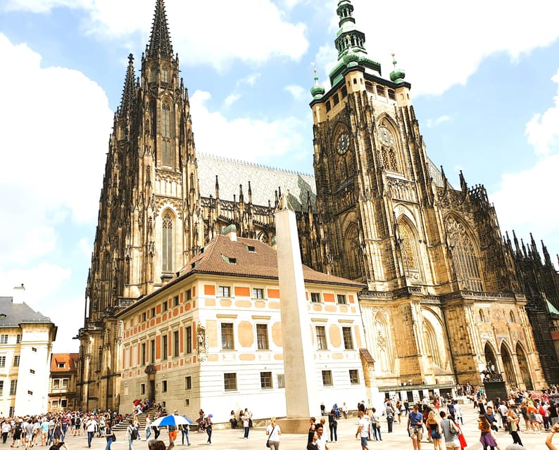 The Vltava bridges and Prague Castle lit at dusk