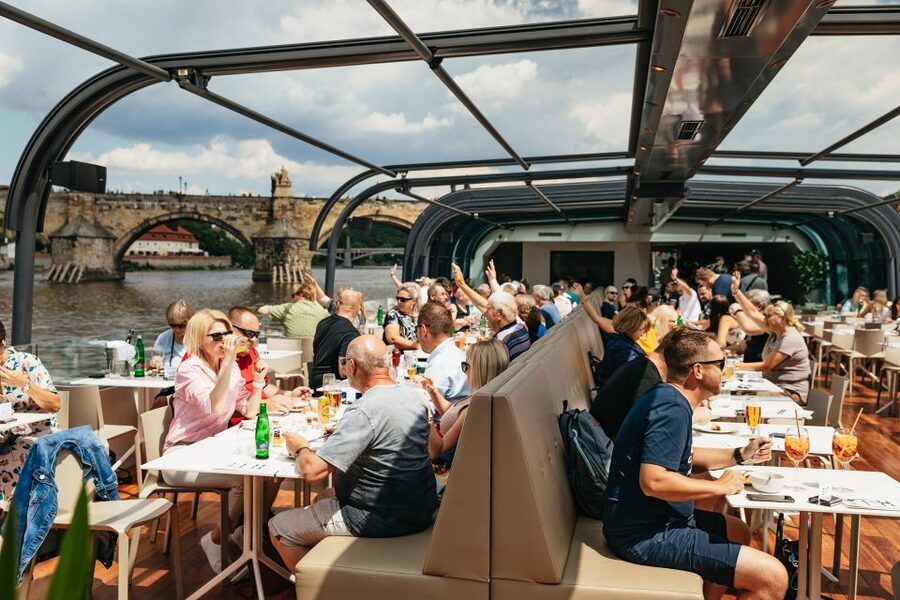 Prague: Vltava River Lunch Cruise in an Open-Top Glass Boat - The Dancing House and Prague beyond the postcard center