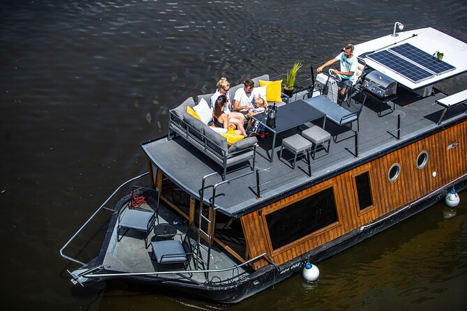 Prague YachtBoat CLASSIC cruise with Unlimited Beer or Prosecco - The Dancing House and National Theatre from the river