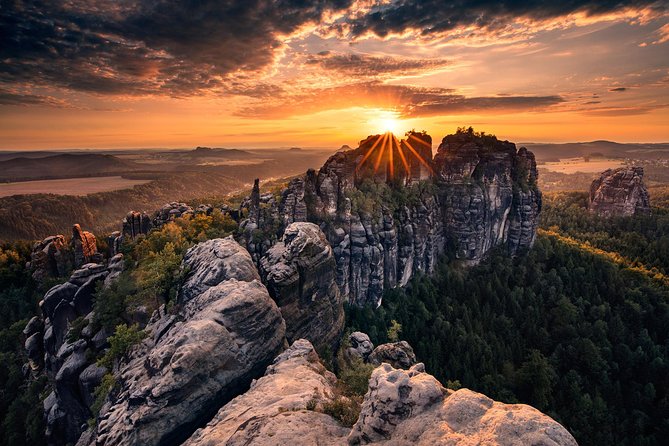 Private Custom Full day tour - Top Highlights of Bohemian & Saxon Switzerland - A boat between the cliffs of Kamenice Gorge