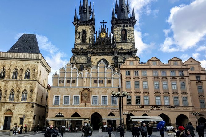 Secrets of Prague Old Town: Self-Guided Puzzle Walk - Charles Bridge towers mark the route toward the castle